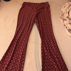 orange and red colored long pants